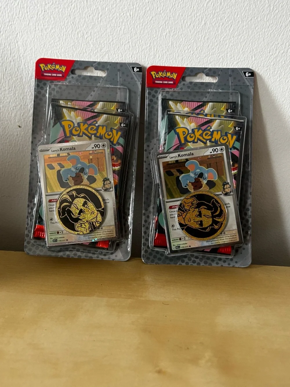10 Pokémon Larry's Komala Promo Pack‎ - Blue, Gold